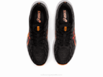 Asics dinablasto 2 zapatillas negras naranjas con impacto - Image 6