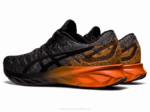 Asics Dinablasto Zapatillas Negro Naranja para Correr - Image 3