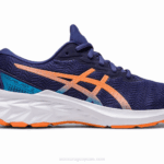Asics escuela primaria novablast 2 azul índigo melocotón estilo y comodidad