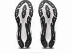 Asics Novablast 3 Zapatillas Running Blanco Negro Elegancia y Comodidad - Image 7