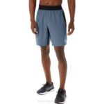 Asics pantalón corto mezclador 9 pulgadas hombre azul acero con estilo