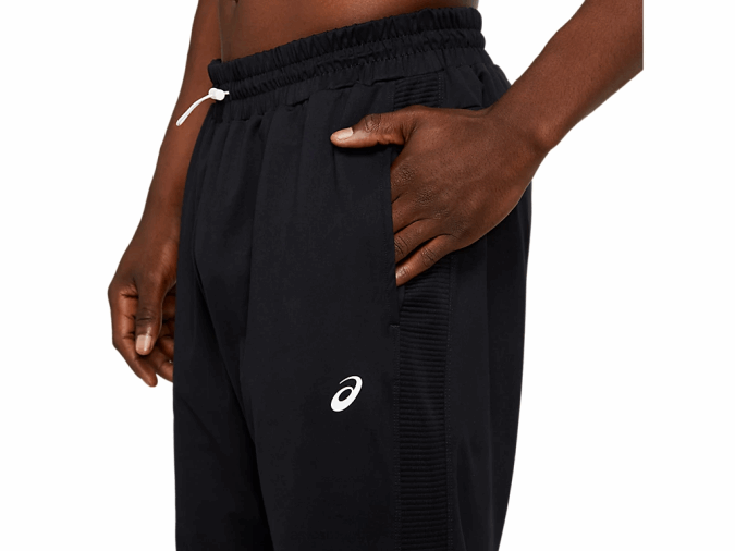 Pantalón cónico de polar Thermopolis Asics negro para hombre rendimiento cómodo y ligero - Image 3